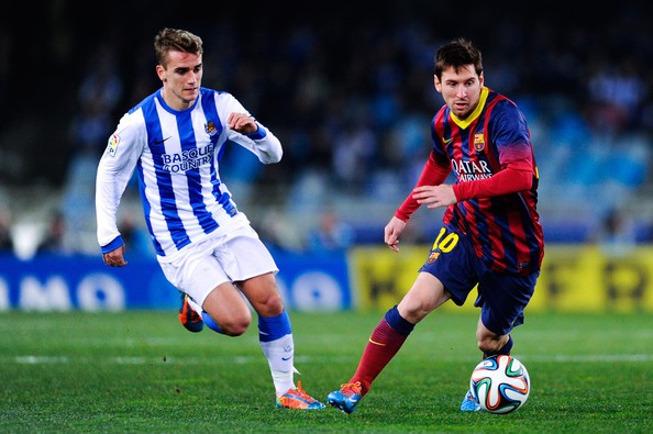 Lionel Messi and Antoine Griezmann during a match