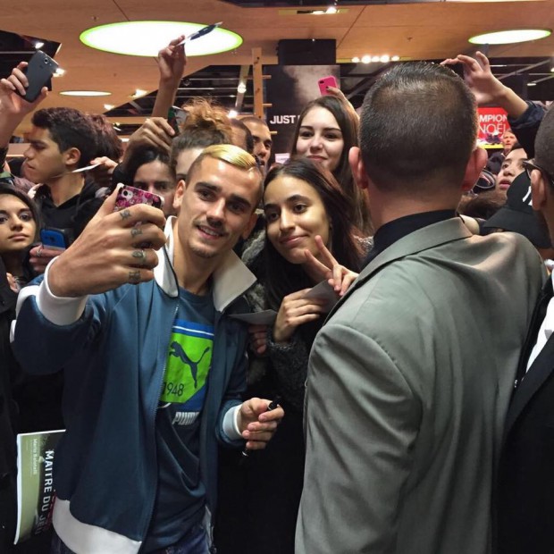 Antoine posing for a selfie with fans