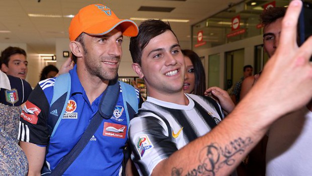 Del Piero posing for a selfie with a fan