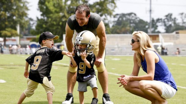 Drew Brees and his wife Brittany with their sons