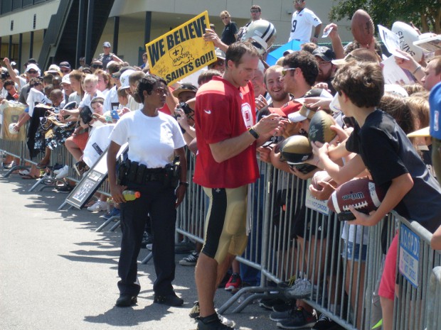 Drew Brees signing autographs to fans at New Orleans Saints training camp