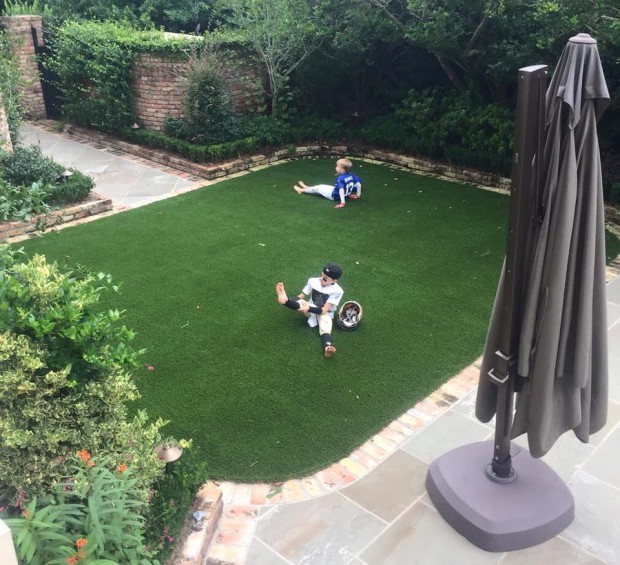 Drew Brees kids playing the house garden