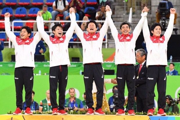 Kohei Uchimura and with fellow teammates at Rio Olympics 2016