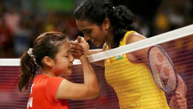 PV Sindhu shaking hands with Nozomi after winning semifinal match