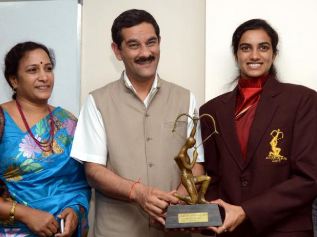 P. Vijaya with her daughter as she receives Arjuna award from Jitendra Singh, Sports Minister