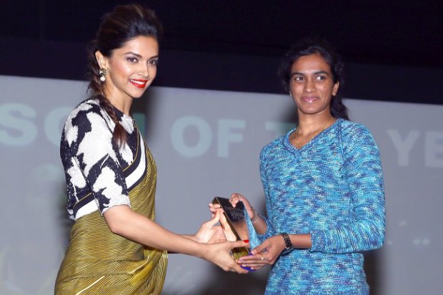Actress Deepika Padukone presents NDTV Sports person of the year award to PV Sindhu