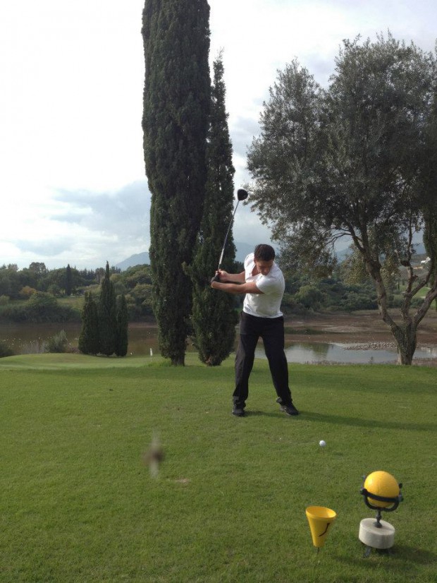 Ryan playing Golf during his Spain visit
