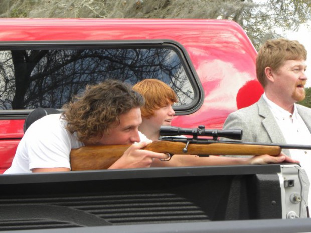 Swimmer become shooter for a fundraising event