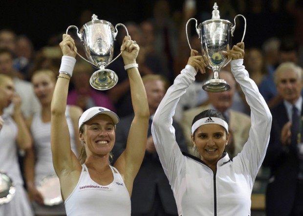  Sania Mirza and Martina Hingis with their Wimbledon trophies