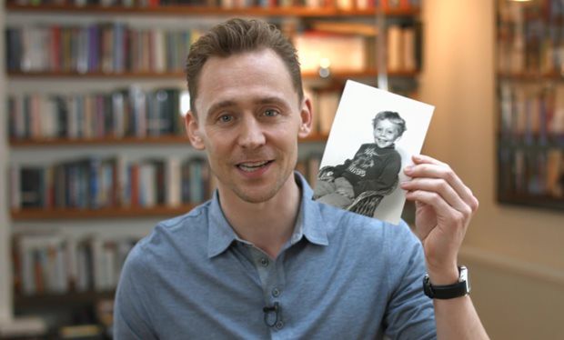 Tom showing his childhood photo during UNICEF campaign